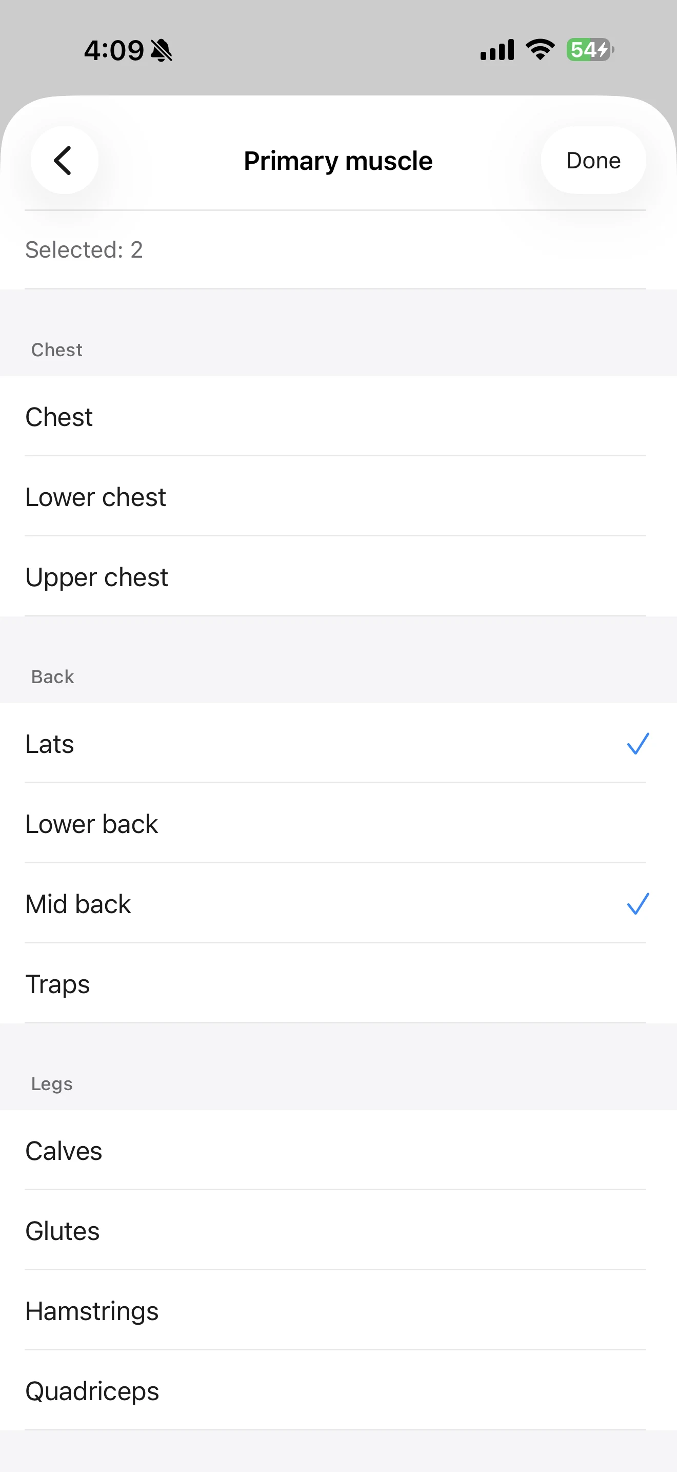 Fitness Karma muscle selection screen showing Lats and Mid back selected as primary muscles.