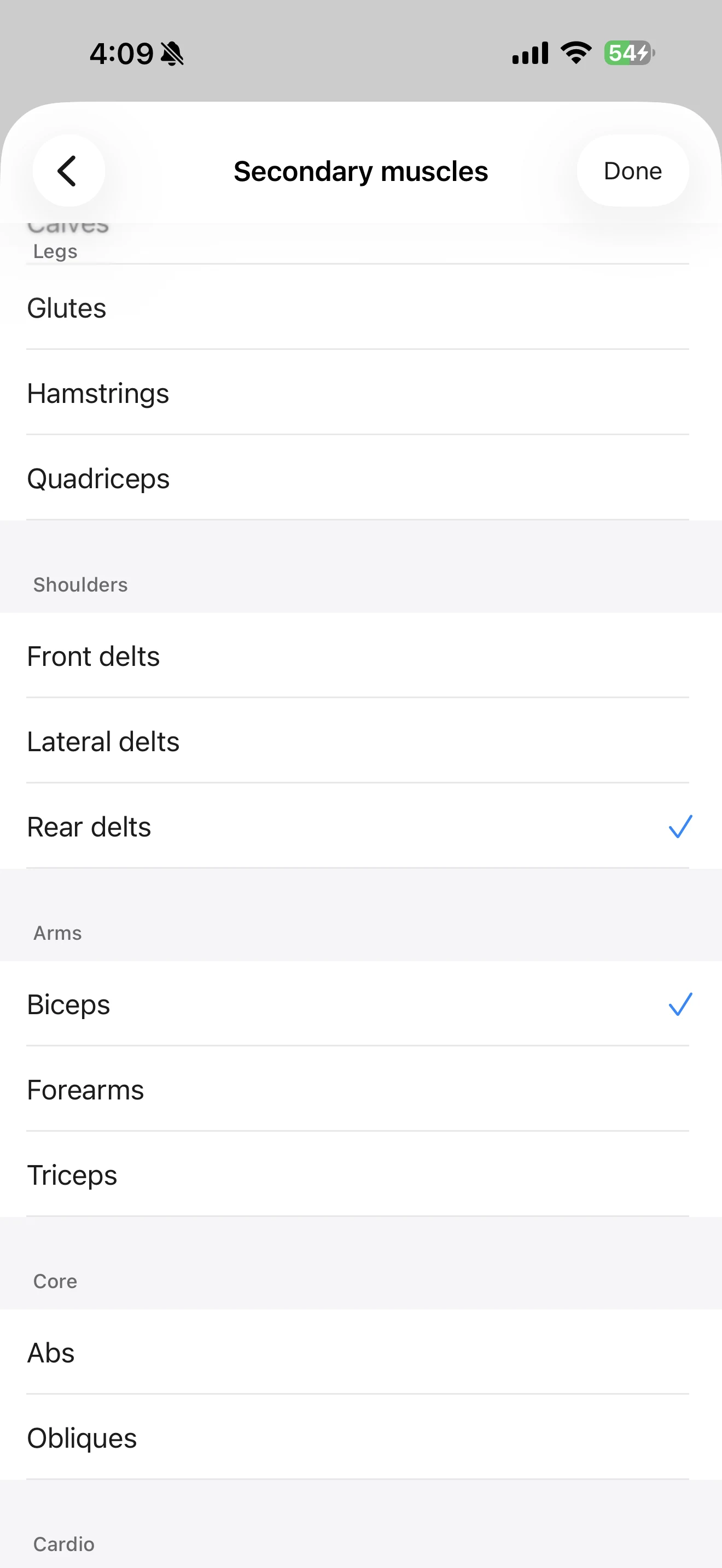 Fitness Karma muscle selection screen showing Biceps and Rear delts selected as secondary muscles.