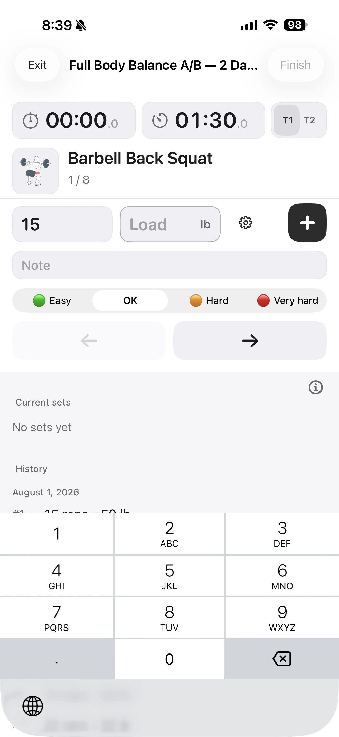 Fitness Karma active workout with 15 reps retained, the Load field cleared and ready for input, and the numeric keyboard open.